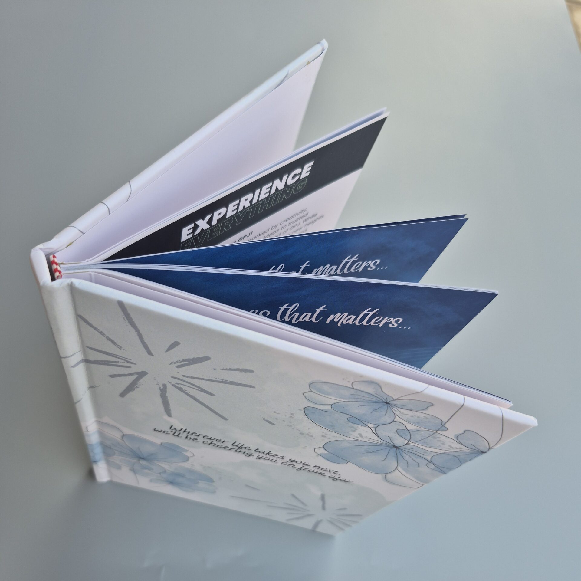 Illustrated interior pages of a hardcover book designed and printed in Singapore.