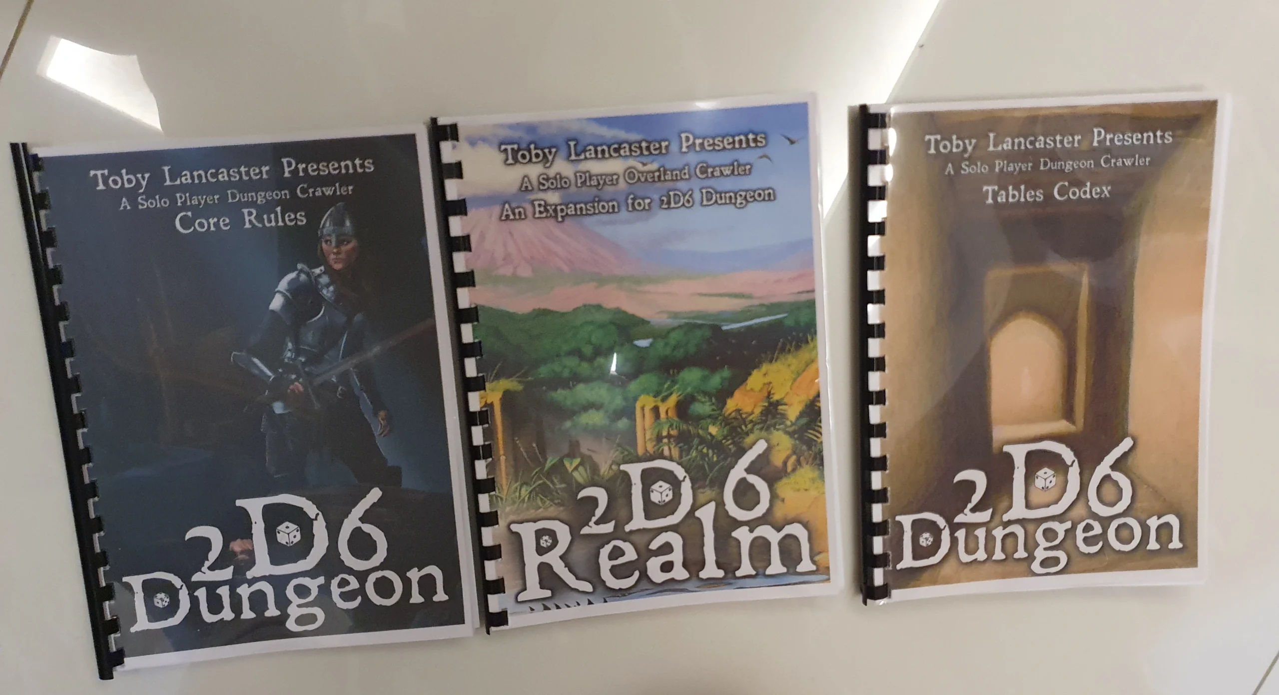 coil binding vs comb binding comparison for professionally printed books.