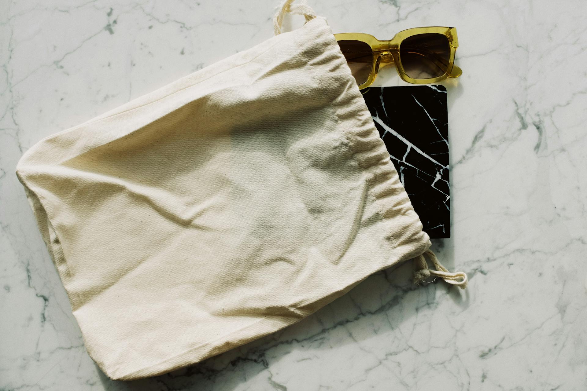 Close-up view of cotton tote bag material texture commonly used in reusable bags and promotional tote bag material printing.