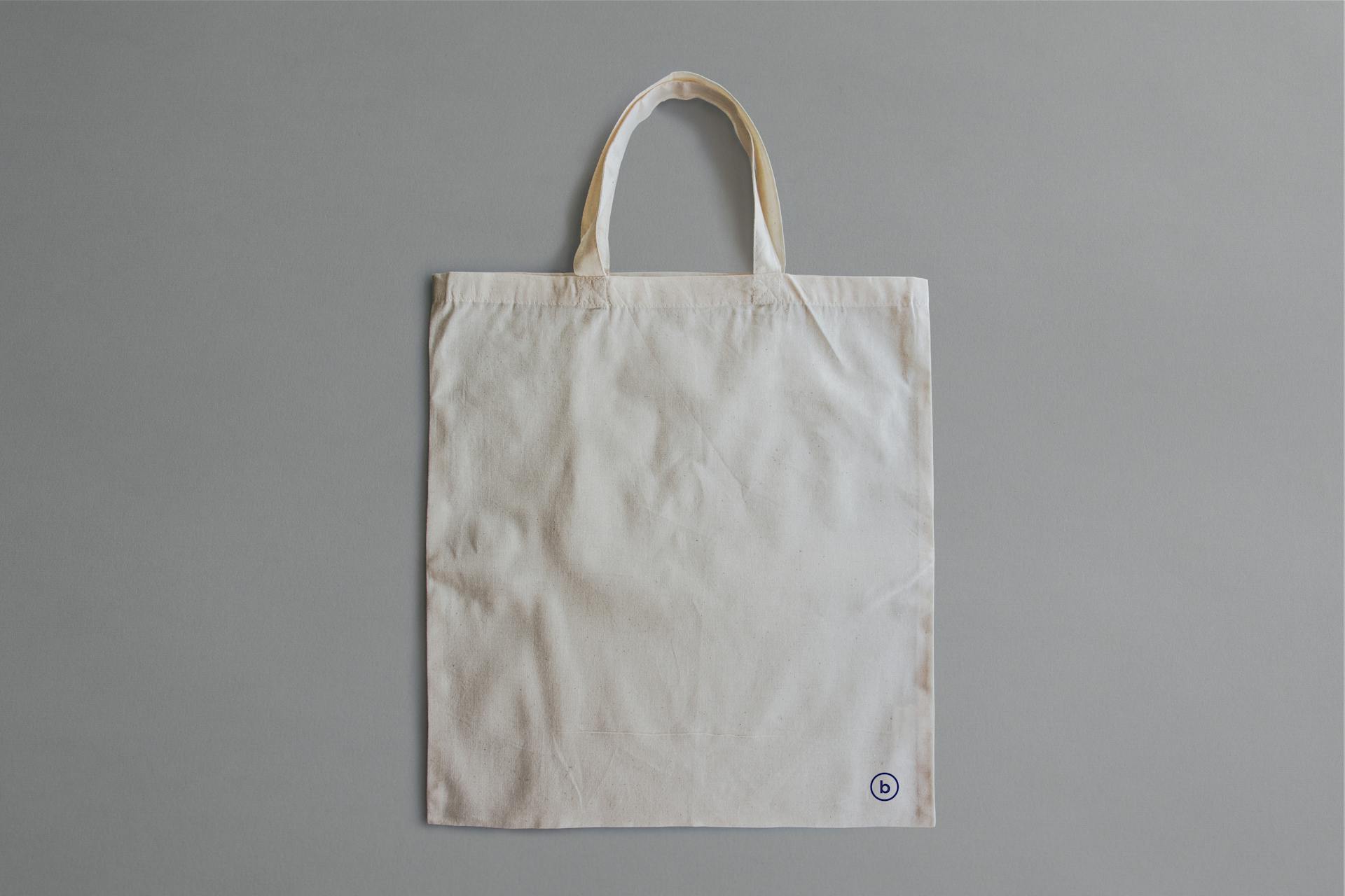 Plain cotton tote bag material commonly used for custom printing, promotional merchandise and reusable branded bags.
