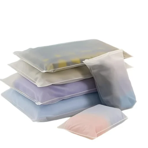 frosted-zipper-bags-towels-textiles Frosted zipper bags in different sizes for towels, fabrics and textile packaging.