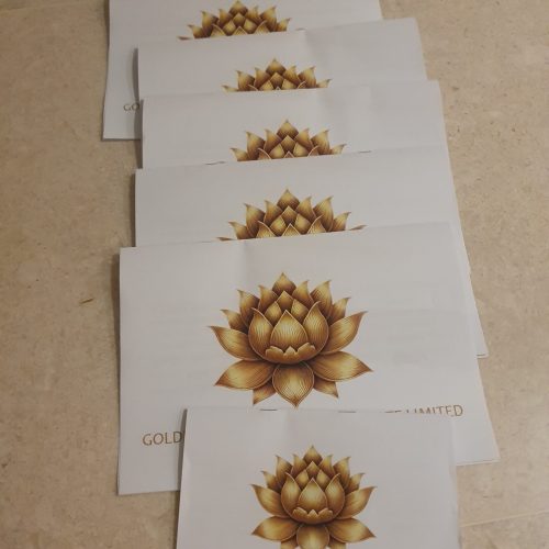 saddle-stitch-binding-corporate-brochure Custom saddle stitch binding for corporate booklets printed for Golden Eva Corporation featuring gold lotus cover design